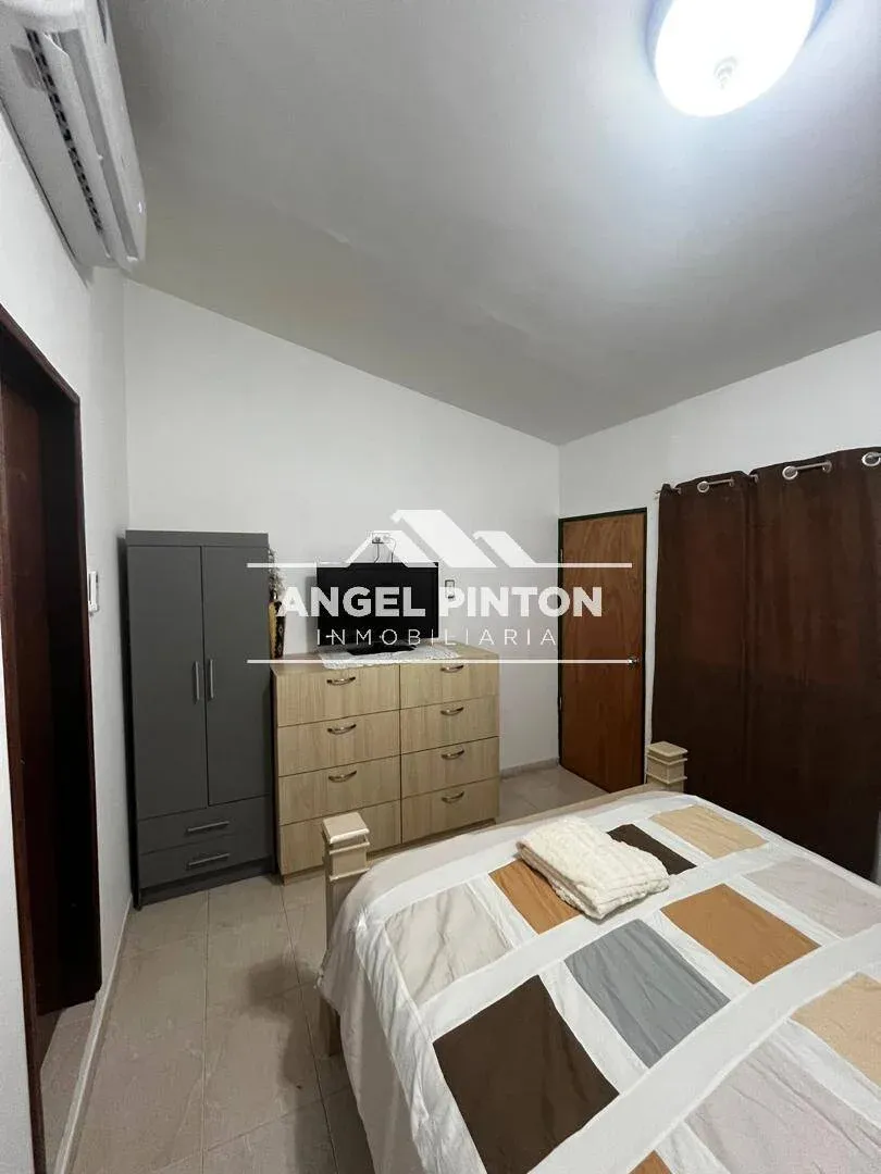 ANEXO ALQUILER. AV 9B MARACAIBO VENEZUELA API 97898 - 4