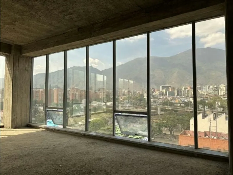 AMPLIA OFICINA CON VISTA AL AVILA EN LAS MERCEDES OBRA GRIS Anma