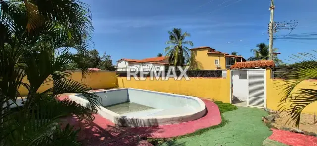 APARTAMENTO UBICADO EN PLAYA EL AGUA ISLA DE MARGARITA CON UN POTENCIAL TURISTICO IDEAL PARA APLICACIONES VACACIONALES A SOLO PASOS DE LA PLAYA MAS ICONICA DE LA ISLA - 9