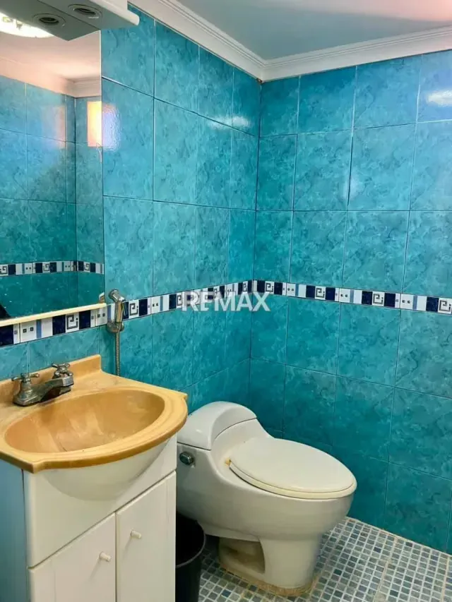 Casa actualizada en Urbanización Altamira, Zona Oeste. En Venta - 12
