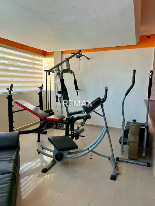 Casa actualizada en Urbanización Altamira, Zona Oeste. En Venta - 6