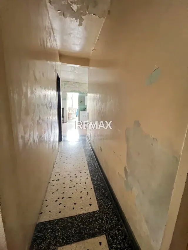 Casa Comercial para remodelar – Av. Principal La Cooperativa - 7