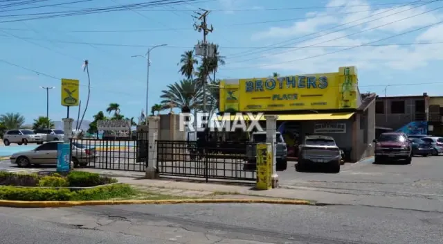 OPORTUNIDAD ÚNICA DE INVERSIÓN: TERRENO CON CENTRO COMERCIAL EN LA ESQUINA MÁS CODICIADA Y UBICACIÓN TRIPLE A | AVENIDA PRINCIPAL CRUCE CON BULEVAR LIDO, LECHERÍA - 4