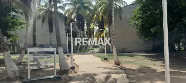 APARTAMENTO DÚPLEX EN VENTA IDEAL PARA MODERNIZAR COMPLEJO TURÍSTICO EL MORRO RES. DORAL BEACH PTO. LA CRUZ VENEZUELA - 3