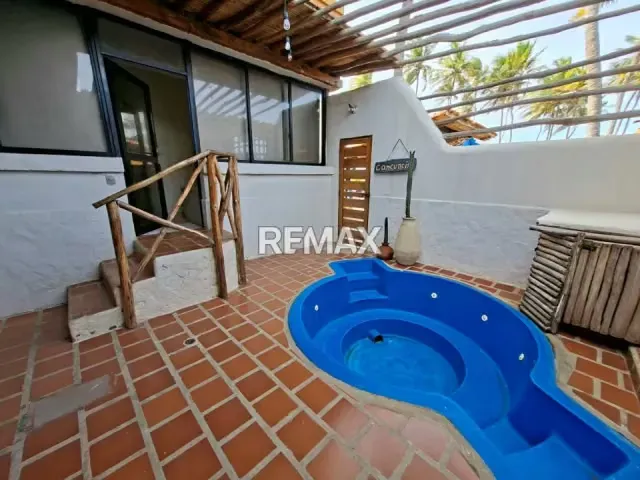 EN VENTA EXPECTACULAR APARTAMENTO PLANTA BAJA EN EL HERMOSO CONJUNTO RESIDENCIAL PLAYA LOS COCOS GARDEN EN PLAYA NORTE CHICHIRIVICHE - 14