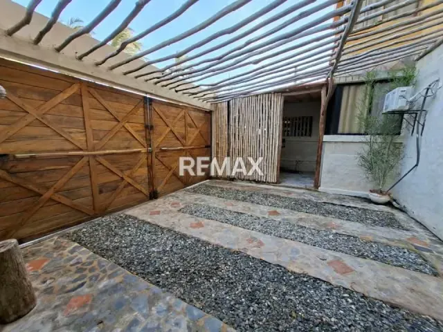 EN VENTA EXPECTACULAR APARTAMENTO PLANTA BAJA EN EL HERMOSO CONJUNTO RESIDENCIAL PLAYA LOS COCOS GARDEN EN PLAYA NORTE CHICHIRIVICHE - 2