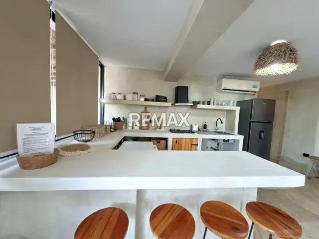 EN VENTA EXPECTACULAR APARTAMENTO PLANTA BAJA EN EL HERMOSO CONJUNTO RESIDENCIAL PLAYA LOS COCOS GARDEN EN PLAYA NORTE CHICHIRIVICHE - 4