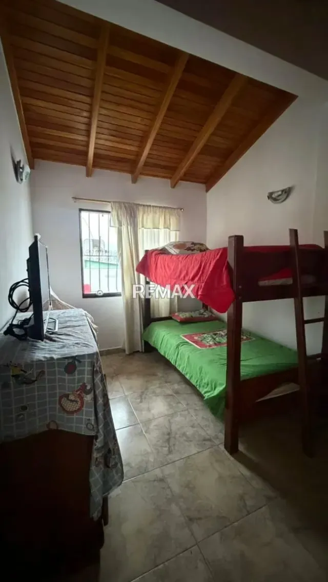 En Venta Esta casa de 2 niveles combina funcionalidad ofreciendo un espacio listo para habitar. - 12