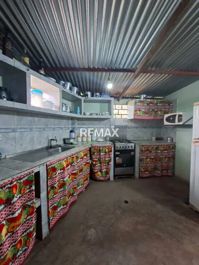 En venta Casa de Campo con solar en las guamas calle principal de cordero - 12