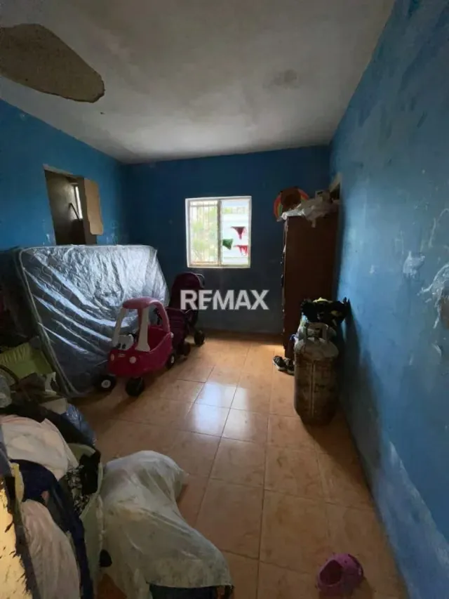 CASA CON LOCAL COMERCIAL EN VENTA Excelente ubicación en pleno centro de la ciudad. - 6