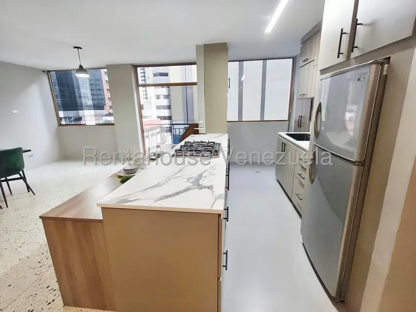 Apartamento (1 Nivel) en Alquiler en Los Dos Caminos, Distrito Metropolitano - 12