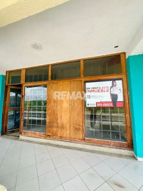EN VENTA LOCAL COMERCIAL A ORILLA DE CARRETERA EN EL CENTRO COMERCIAL CARIBBEAN