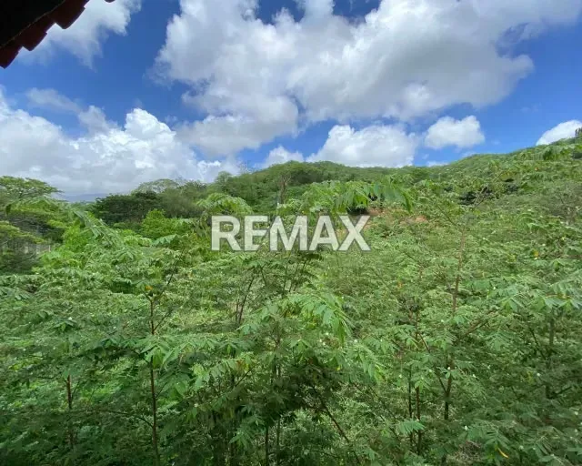 ¡TU FUTURO EN MARGARITA! SE VENDE TERRENO DE 1,064M² JUNTO A VERSÁTIL LOCAL COMERCIAL Y 2 APARTAMENTOS EN 1,000M² DE CONSTRUCCIÓN SOBRE OTRO TERRENO DE 2,128M² A TU DISPOSICIÓN. - 11